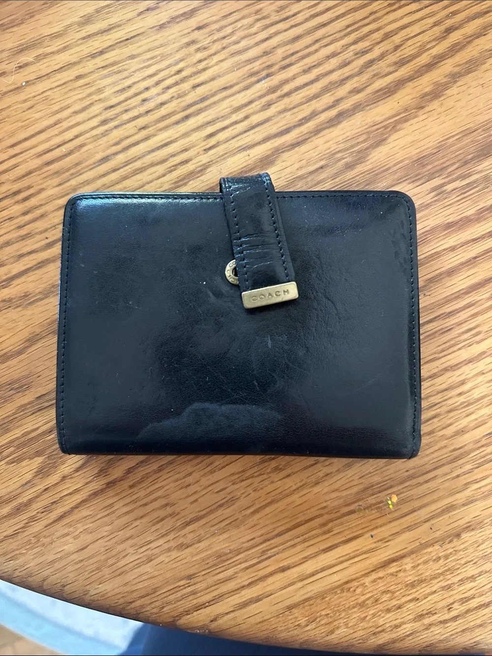 Coach Black Leather Compact Wallet with Gold-Tone Logo